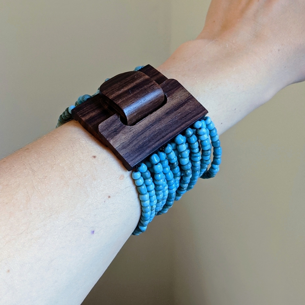 Turquoise beads Hand-Carved Wooden Cuff